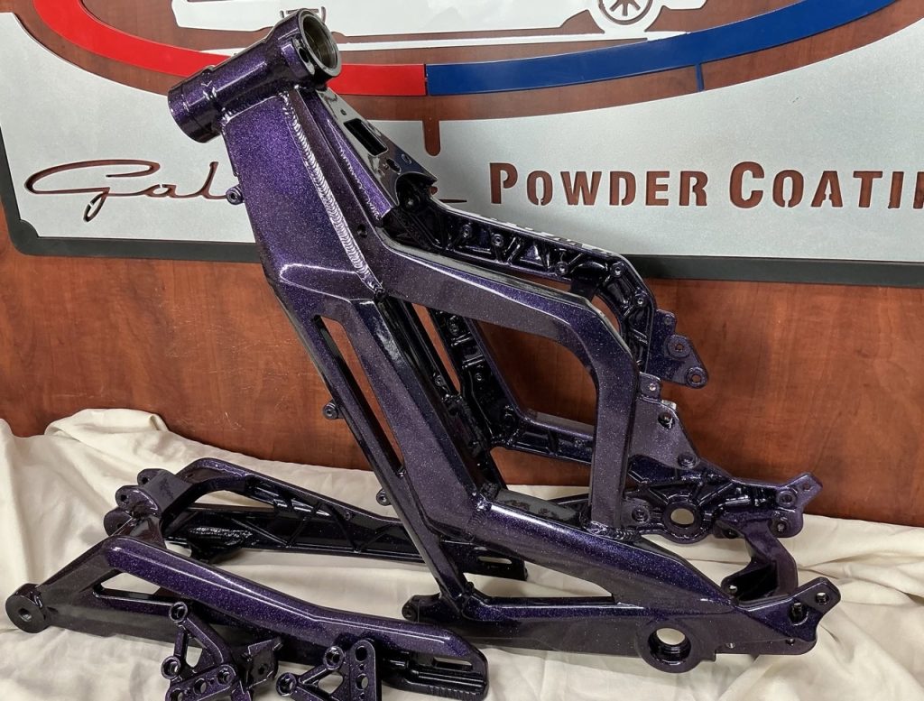 custom cherry violet powder coated frame for e-dirt bike by galaxie powder coating