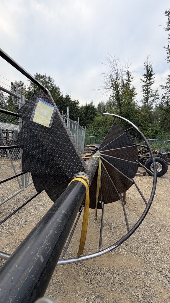 spiral metal staircase being prepared for sandblasting by lumby powder coater